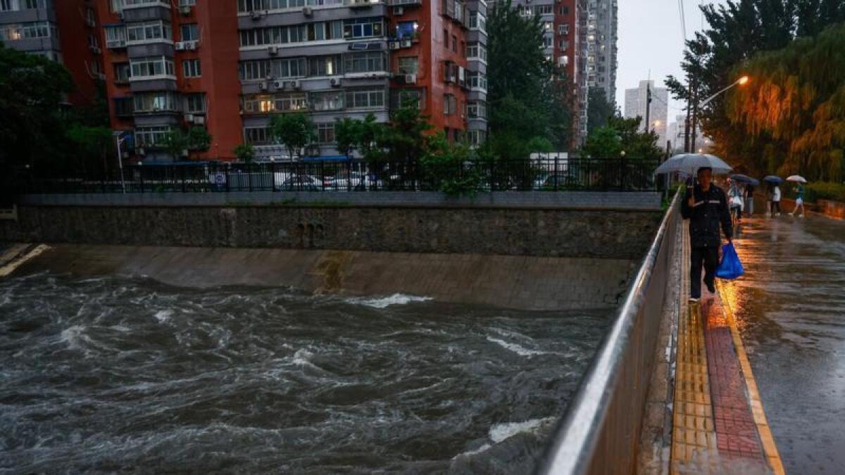 ۱۱ کشته و شماری مفقود بر اثر سیل در پایتخت چین