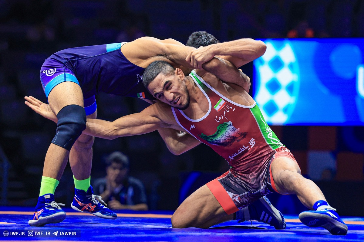 کشتی آزاد قهرمانی جهان| عموزاد با انتقام از حریف ژاپنی قهرمان شد + فیلم