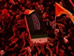 طواف پیکر پاک رهبر شهید انقلاب به دور ضریح حضرت عباس
