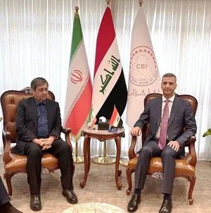 همتی خواستار تسریع در رفع موانع بانکی میان ایران و عراق شد