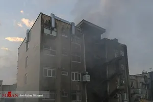 آخرین تصاویر از شهید دارابی در عملیات اطفای حریق ساختمان ۱۵۳