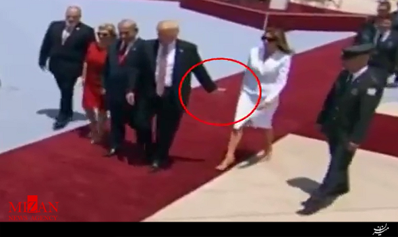 پسزدن دست ترامپ از طرف همسرش پسزدن دست ترامپ از طرف همسرش