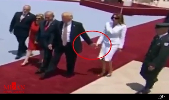 پسزدن دست ترامپ از طرف همسرش پسزدن دست ترامپ از طرف همسرش