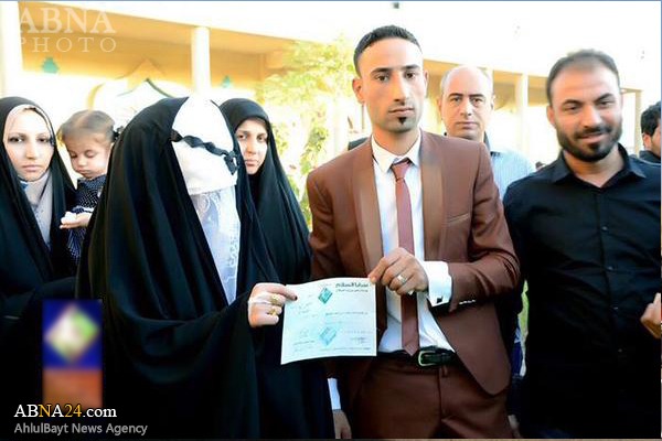 تقدیر زوج عراقی از رزمندگان حشد شعبی + عکس