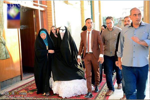 تقدیر زوج عراقی از رزمندگان حشد شعبی + عکس تقدیر زوج عراقی از رزمندگان حشد شعبی + عکس
