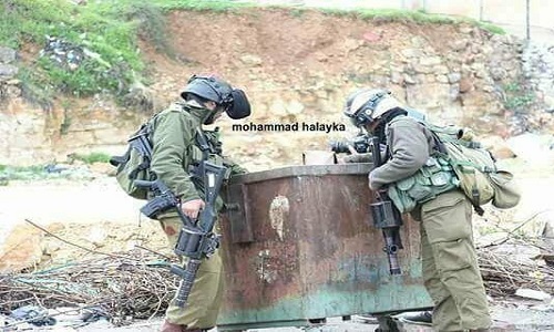 سرباز اسرائیلی در سطل زباله سرباز اسرائیلی در سطل زباله