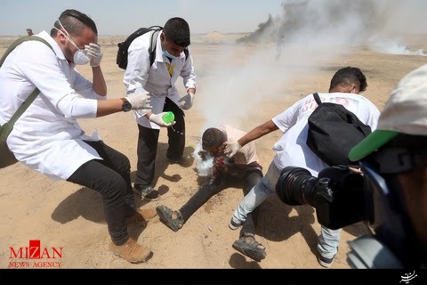 شلیک مستقیم گاز اشک آور صهیونیستها به صورت جوان فلسطینی + تصاویر شلیک مستقیم گاز اشک آور صهیونیستها به صورت جوان فلسطینی + تصاویر