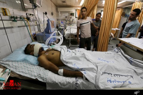 شلیک مستقیم گاز اشک آور صهیونیستها به صورت جوان فلسطینی + تصاویر شلیک مستقیم گاز اشک آور صهیونیستها به صورت جوان فلسطینی + تصاویر