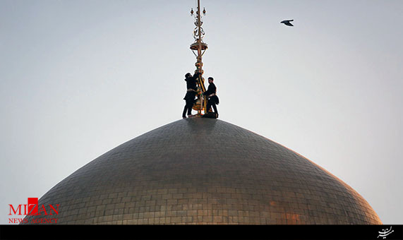 آئین تعویض پرچم حرم مطهر رضوی در سالروز میلاد امام رضا (ع) + فیلم