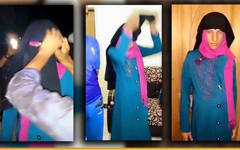 داعشی فراری با مانتوی آبی و روسری صورتی داعشی فراری با مانتوی آبی و روسری صورتی