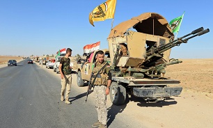 اذعان تحلیلگران به نقش کلیدی حشد الشعبی در مبارزه با تروریسم در عراق