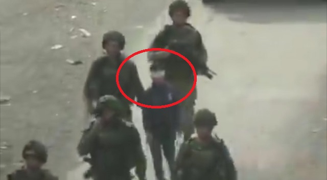 بازداشت کودک فلسطینی با چشمان بسته در فلسطین اشغالی! بازداشت کودک فلسطینی با چشمان بسته در فلسطین اشغالی!