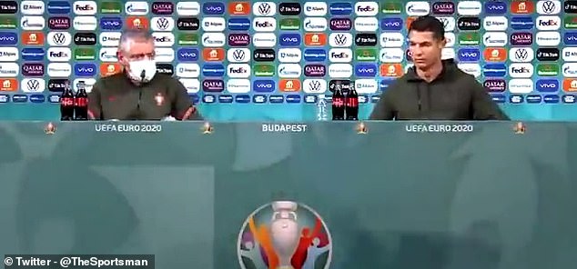 سرشاخ شدن رونالدو با کوکاکولا + عکس سرشاخ شدن رونالدو با کوکاکولا + عکس