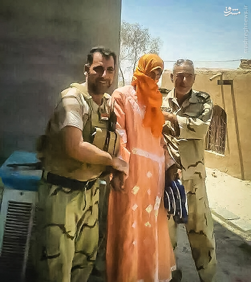 دستگیری یک داعشی با لباس زنانه + عکس دستگیری یک داعشی با لباس زنانه + عکس