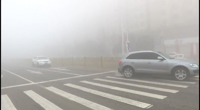هشدارقرمر در چین/کاهش دید تا ۵۰ متر هشدارقرمر در چین/کاهش دید تا ۵۰ متر